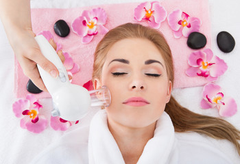 Young Woman Getting Laser Therapy