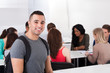 © Andrey Popov - Confident Male Student Carrying Backpack In Classroom