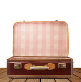 Fototapeta Paryż - valigia vintage con base legno