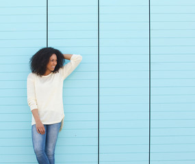 Wall Mural - Beautiful young woman laughing outdoors