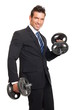 © petrdlouhy - Handsome businessman at suit exercises with dumbbells