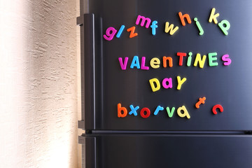 Wall Mural - Colorful magnetic letters on  refrigerator