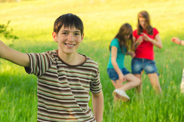 Wall Mural - Teenage boy having fun with his friends