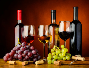 Red, white and rose wine with grapes