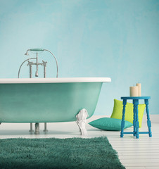 Wall Mural - Classic blue bathtub with a stool and aged wood floor