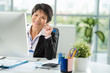 © DragonImages - Asian business lady
