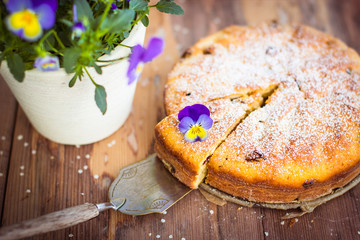 Delicious pie on wooden table. Selective focus