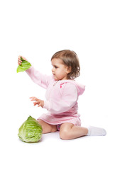 Wall Mural - little girl with cabbage