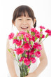 © Tom Wang - close up of happy little girl holding  a bouquet of carnations