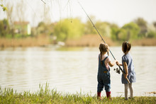 Two Little Girls Fishing