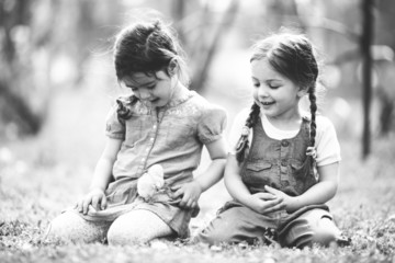 Canvas Print - Two little girls with chickens