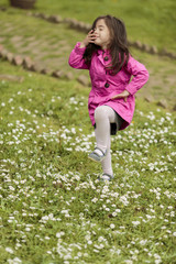 Canvas Print - Little girl at the spring field