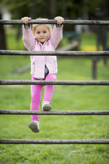 Canvas Print - Cute little girl at playground