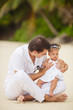 © GTeam - Happy father and his sweet little daughter at beach