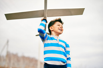 Poster - Playing with toy airplane