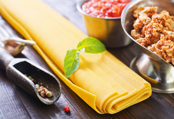 Sticker - dough for lasagna and ingredients for lasagna