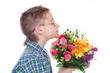 © Smart Future - Handsome boy with flowers in hands