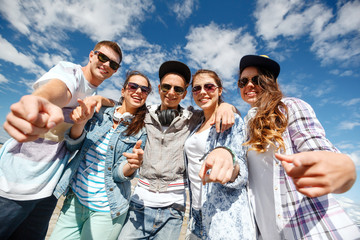 Sticker - smiling teenagers in sunglasses hanging outside