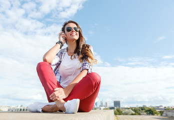 Poster - smiling teenage girl in eyeglasses with headphones