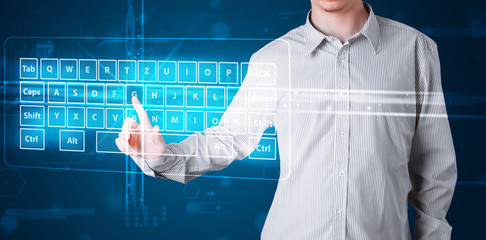 Businessman pressing virtual type of keyboard