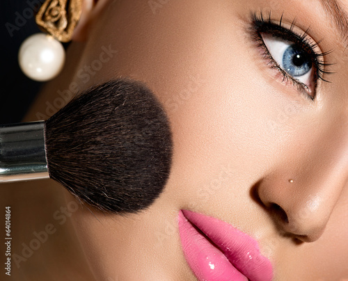 Naklejka dekoracyjna Make-up Applying closeup. Cosmetic Powder Brush for Makeup