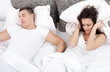© V&P Photo Studio - Snoring man and young woman. Couple sleeping in bed.