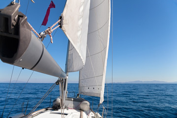 Wall Mural - Sailing boat wide angle view in the sea