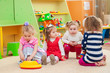 © capable97 - Little girls playing with toys in the playroom