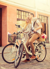 Wall Mural - couple with bicycles in the city