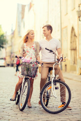 Wall Mural - couple with bicycles in the city