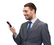 © Syda Productions - young smiling businessman with smartphone