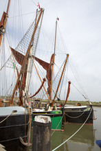 Old Thames Sailing Barges Moored In Dock At Maldon, Essex, Uk