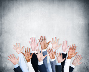 Wall Mural - Group of Human Arms Raised with Concrete Wall