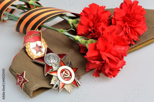 Poster Military cap, red flowers, Saint George ribbon, orders of Great
