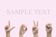 Love hand sign language ,pink background