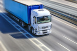 Fototapeta Miasto - truck moves on highway