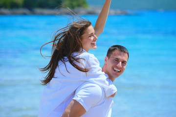 Sticker - happy couple have fun on the beach