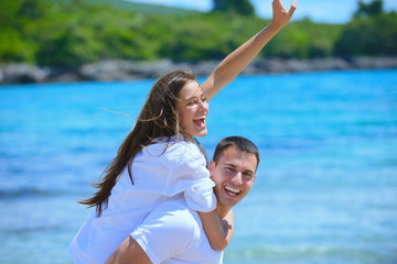 Sticker - happy couple have fun on the beach