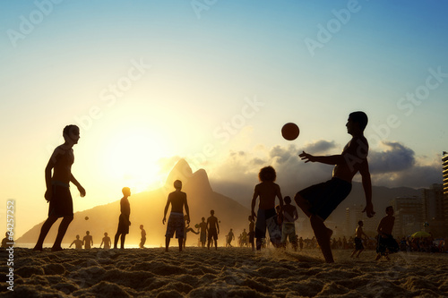 Fotografie, Obraz Sunset Silhouettes Playing Altinho Futebol Beach Football Brazil