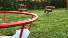 Carousel Spins On The Playground