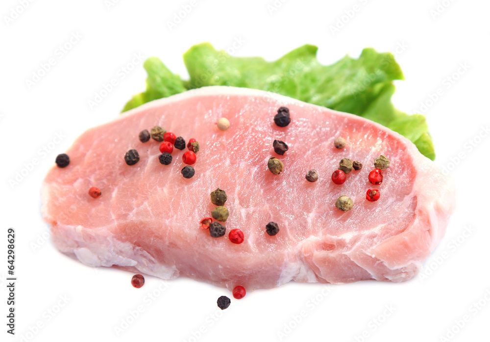Raw meat steak with leaf lettuce and spices, isolated on white