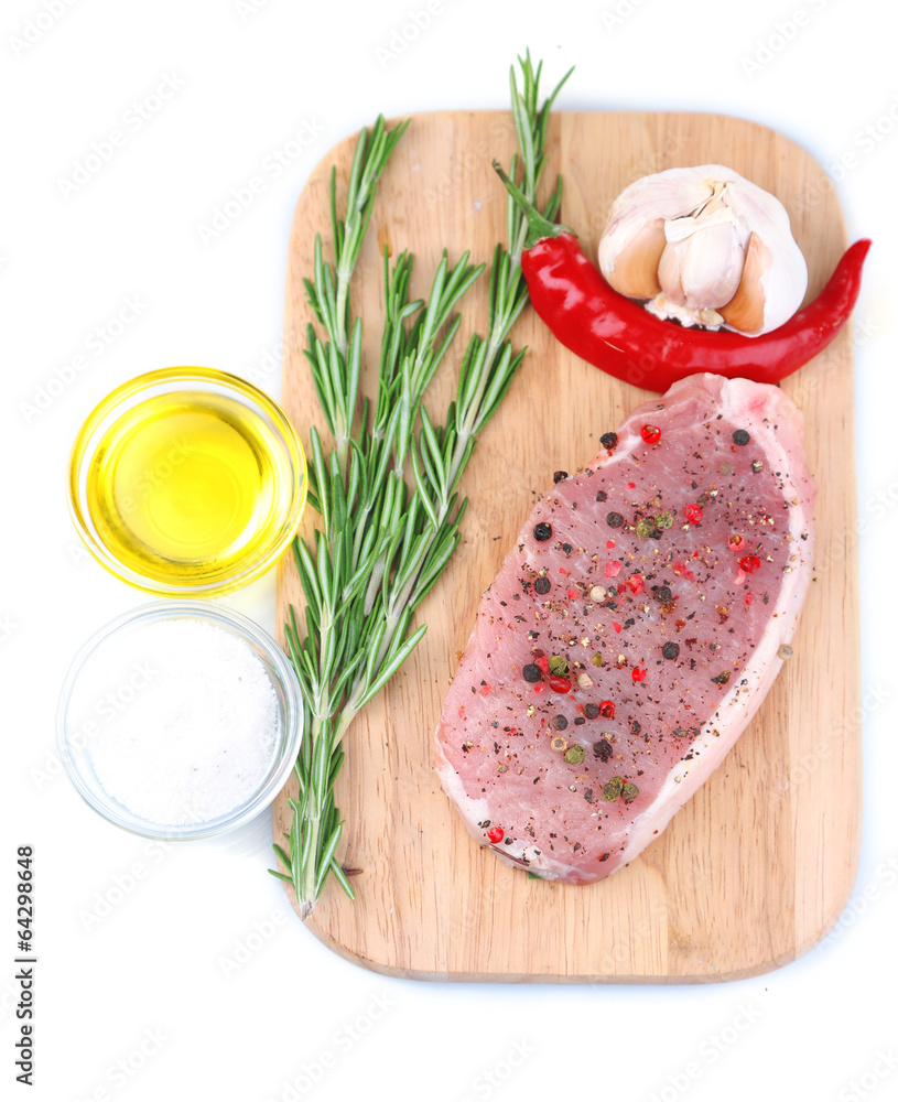 Raw meat steak with herbs and spices