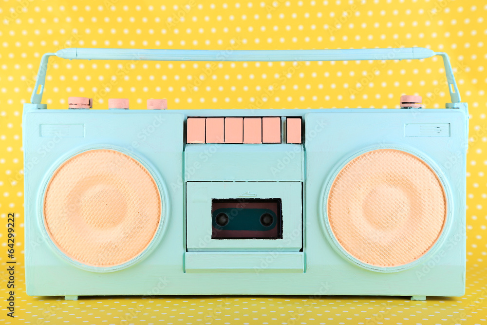 Colorful retro radio, on yellow background