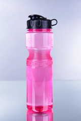 Canvas Print - Sports bottle on grey background