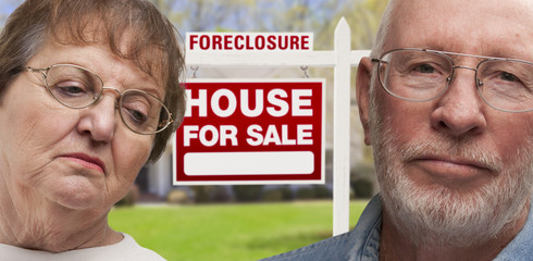 Wall Mural - Depressed Senior Couple in Front of Foreclosure Sign and House