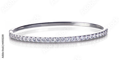 Fotografía Diamond and gold bangle bracelet isolated on white
