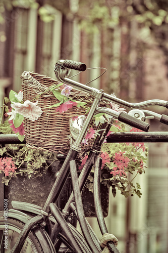 Fototapeta na wymiar Retro styled image of Dutch bicycles in Amsterdam