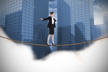 Aufkleber - Composite image of businesswoman performing a balancing act