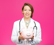 Closeup portrait female doctor holding piggy bank, savings