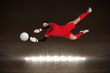 Aufkleber - Composite image of fit goal keeper jumping up